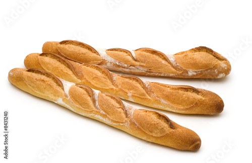 Photo: three baguette on white background three baguette on white background