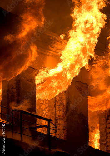 Old brick house on fire