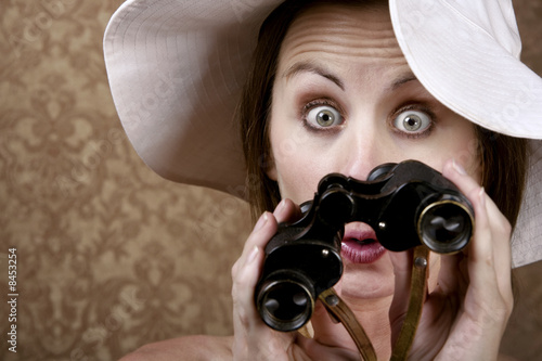 Photo: Woman with Sunglasses and Binoculars Woman with Sunglasses and Binoculars