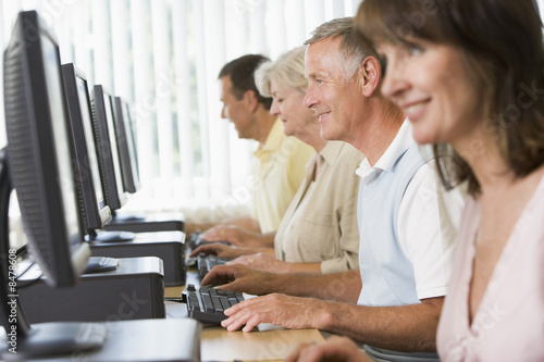 Photo: Adult students in a computer lab Adult students in a computer lab