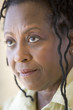 Head shot of woman scowling