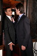  Two men arguing in an elevator
