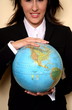  A woman holding a globe