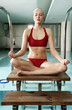 Young woman  in a swimming pool at a spa