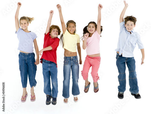 Photo: Five friends jumping and smiling Five friends jumping and smiling