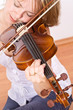 Woman enjoying violin music
