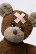 Plastered teddy bear