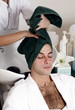 Young man having his hair  washed at a salon