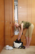 Woman in locker room after work out