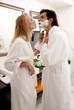 Couple sharing bathroom together
