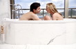 Couple enjoying bubble bath together