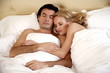 Couple sleeping in bed