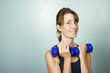 Woman Exercising with Dumbells