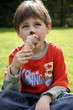 Young boy eating ice cream