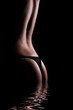 classic low key photo of sexy woman body