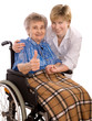 elderly woman in wheelchair giving the thumbs-up sign