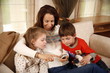 Grandmother relaxing with grandchildren