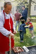 Mature man cooking food at a barbecue