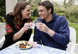 Young couple drinking ouzo