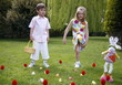 Boy and girl playing in the yard