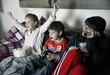 Young people watching television