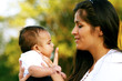 Mother Talking to her Baby Son Infant Boy Mother Talking to her Baby Son Infant Boy