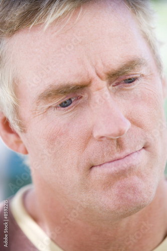 Photo: Head shot of man thinking Head shot of man thinking