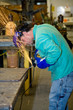 Metal Worker Using Grinder Metal Worker Using Grinder