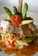 Stylized vegetable tuna pasta plate