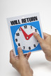 Woman adjusting hands of Will return clock, close-up