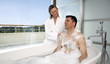 Mature couple having fun in the bathtub