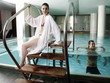 Young couple in a swimming pool at a spa