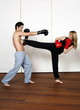 Straight right-hand punch of Active Tae Bo and side kick