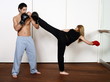 Straight right-hand punch of Active Tae Bo and side kick
