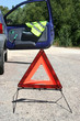 warning triangle and yellow waistcoat