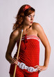 Redhead girl holding a pool cue