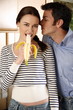 A young couple in the kitchen