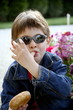 Young boy eating a doughnut