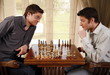Two men playing chess