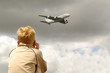 small child deafened by a low flying jet small child deafened by a low flying jet