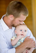 Father Kissing Son