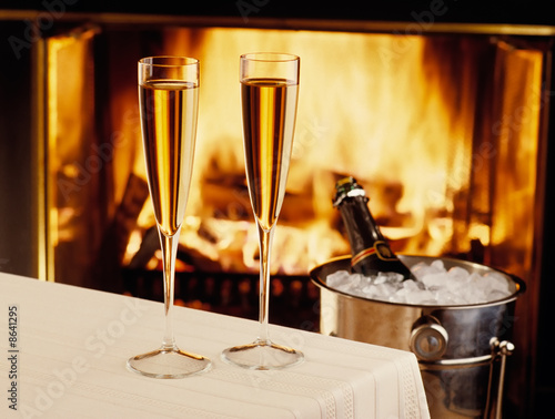 Photo: Champagne chilling by the fire Champagne chilling by the fire