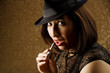 Hispanic Woman Applying Makeup