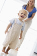 Mother and son indoors smiling