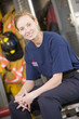 Portrait of a firefighter in the fire station locker room