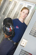 Portrait of a firefighter in the fire station locker room