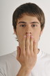 "Young male adult;hand to mouth"