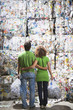 man and woman at a recycling plant.
