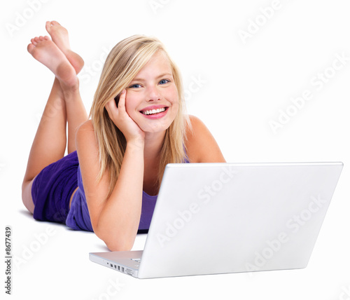 Portrait of a happy young girl with laptop computer