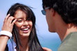 Closeup of young woman looking at man